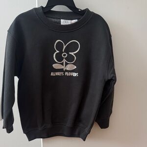 Zara Black Sweatshirt with Silver Flower Graphic. New with tags